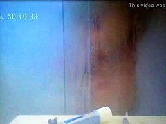 Hidden camera captures German wife's shower cumshot