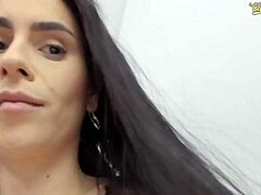 A busty camgirl indulges in self-pleasure and toy play on webcam