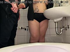 Dirty old woman masturbates son-in-law in the public restroom of the mall